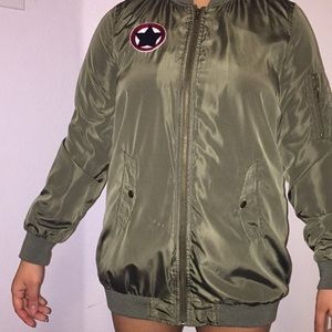 Military green jacket with star.